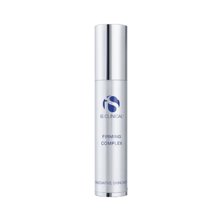 Une bouteille argentée et blanche du produit de soin iS Clinical Firming Complex est représentée à la verticale sur un fond blanc uni. Le flacon a un texte bleu et un design élégant et moderne.